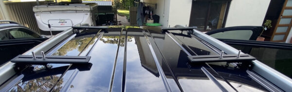 All Rola Low Mount Rail Straps Pushed into Roof Rails on Pajero Sport.