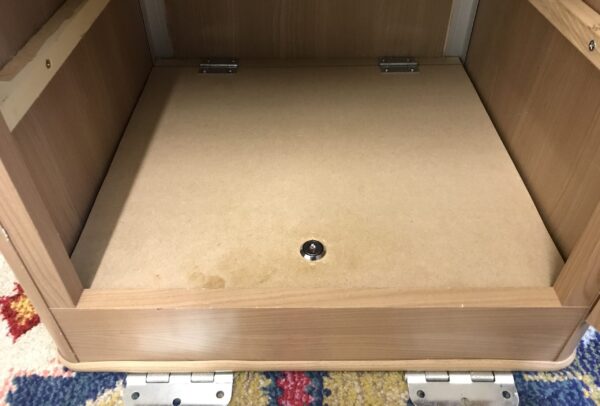 Locked False Bottom in Jayco Swan Camper Trailer Wardrobe