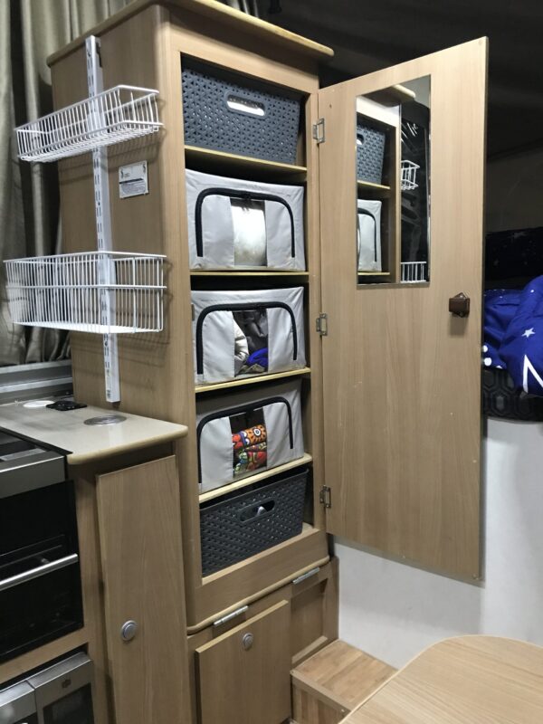 MDF wardrobe shelves in Jayco Swan Camper Trailer with Aldi Collapsible Storage Boxes